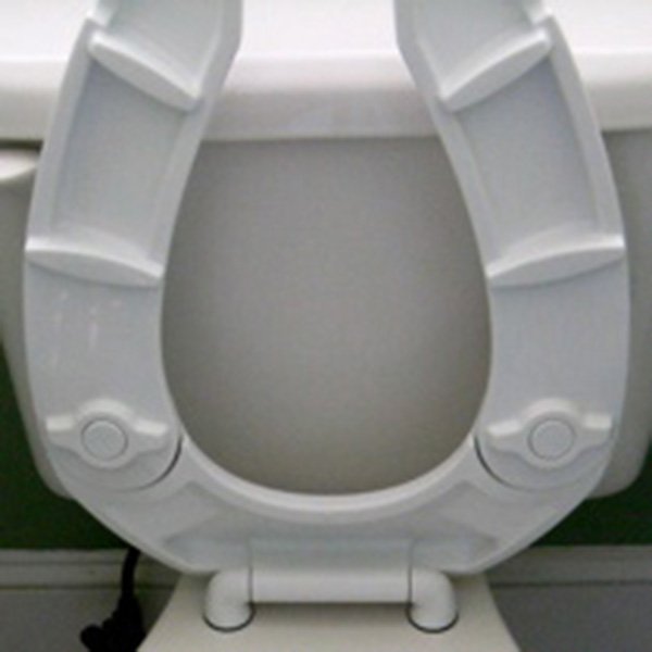 Adjustable Polypropylene Toilet Seat White Ocelco